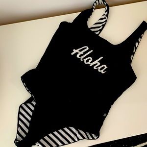 Reversible one piece swim